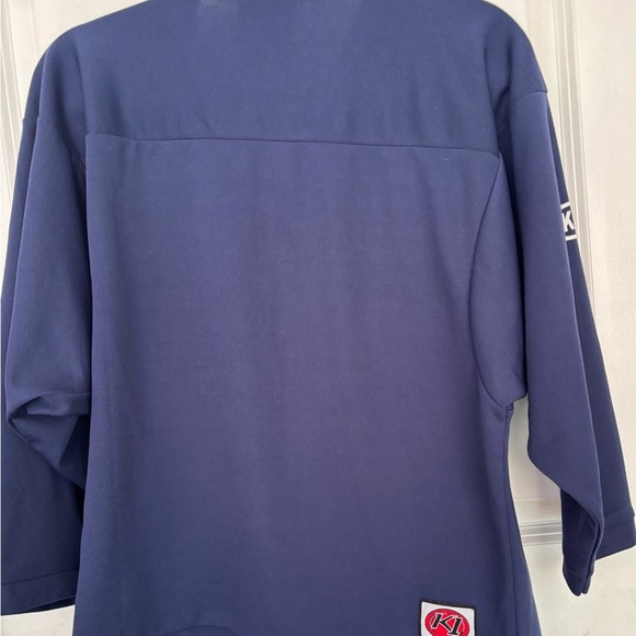 🌶️🌶️🌶️🌶️ Buy 2 or more T’s at $10 each
Navy K-1 Hockey Shirt- NWOT - Picture 2 of 3